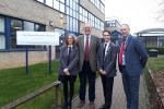 John with Headteacher, Daniel Steel and Head Boy and Girl Mitchell Freeman and Ellis Clark